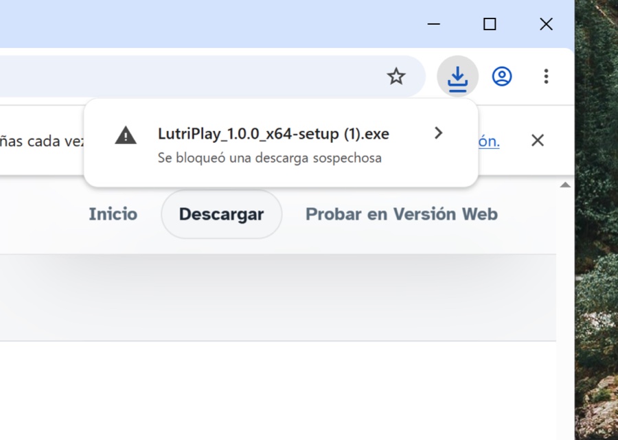 Aviso del navegador: se bloqueó una descarga sospechosa, con la flecha para abrir el menú.